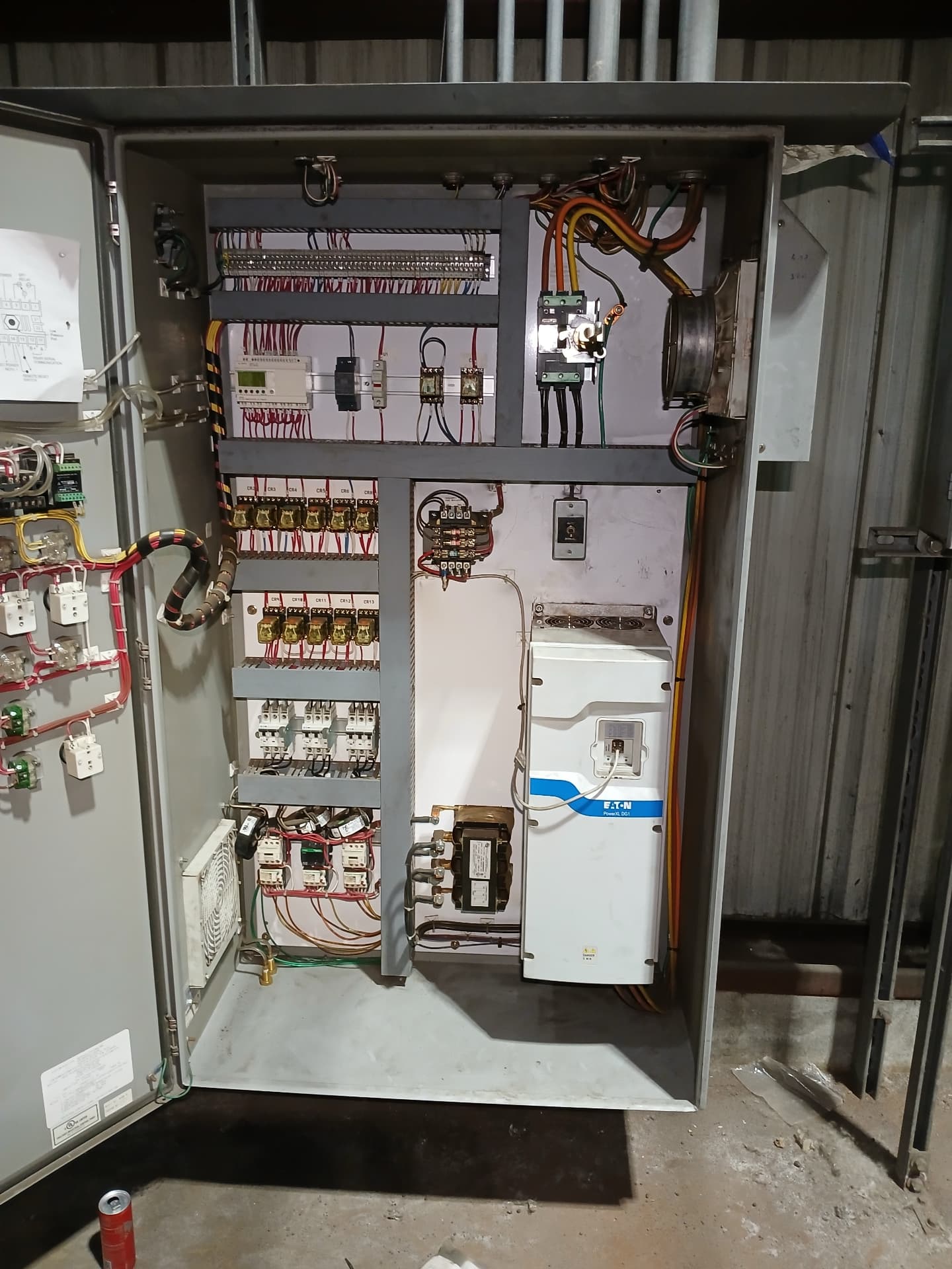 Full motor control cabinet with drives, contactors, and relay banks