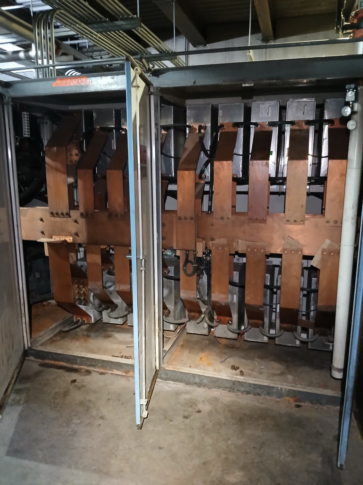 Heavy copper bus connections inside industrial switchgear